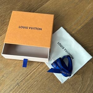 Louis Vuitton box, pouch, and ribbon